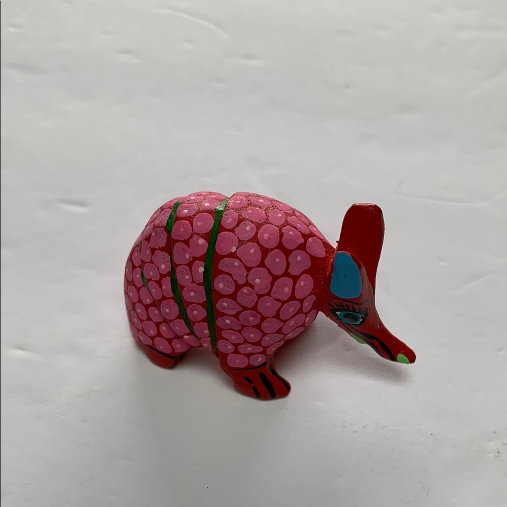 Pink and Red Armadillo Figurine